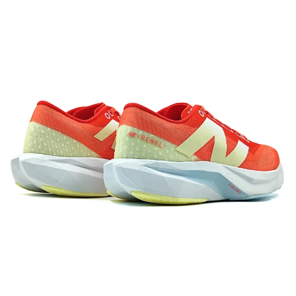NB FuelCell Rebel V4 - Coral/Gold